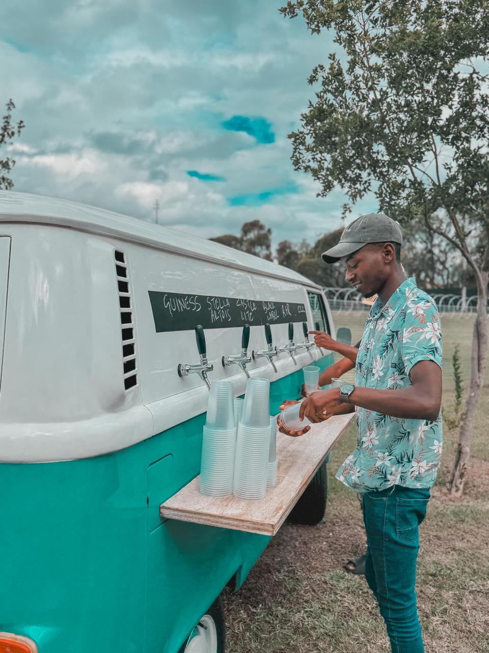 Professional beer taps and keg system on the side of the Drink Up mobile bar.